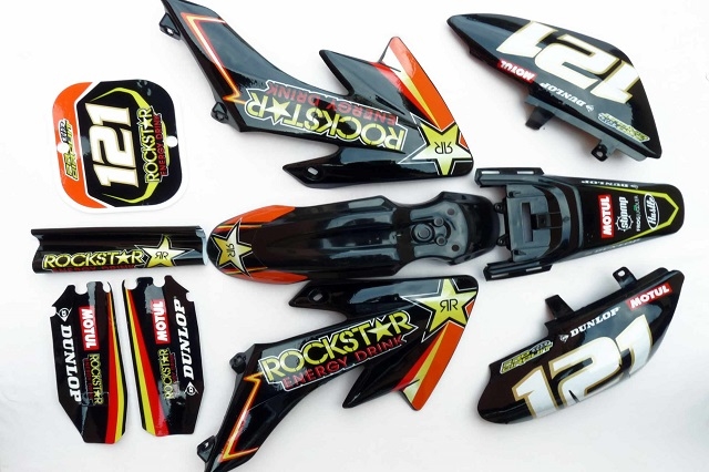 pitbike plasty černé CRF50 s polepy rockstar/oranžové, Stomp, DemonX, WPB