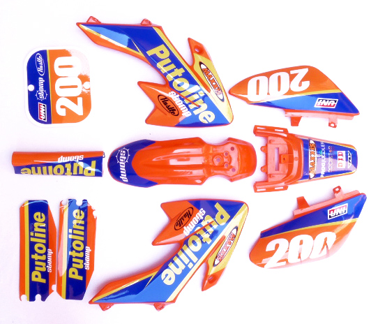 pitbike oranžové plasty CRF50 s polepy Putoline, Stomp, DemonX, WPB